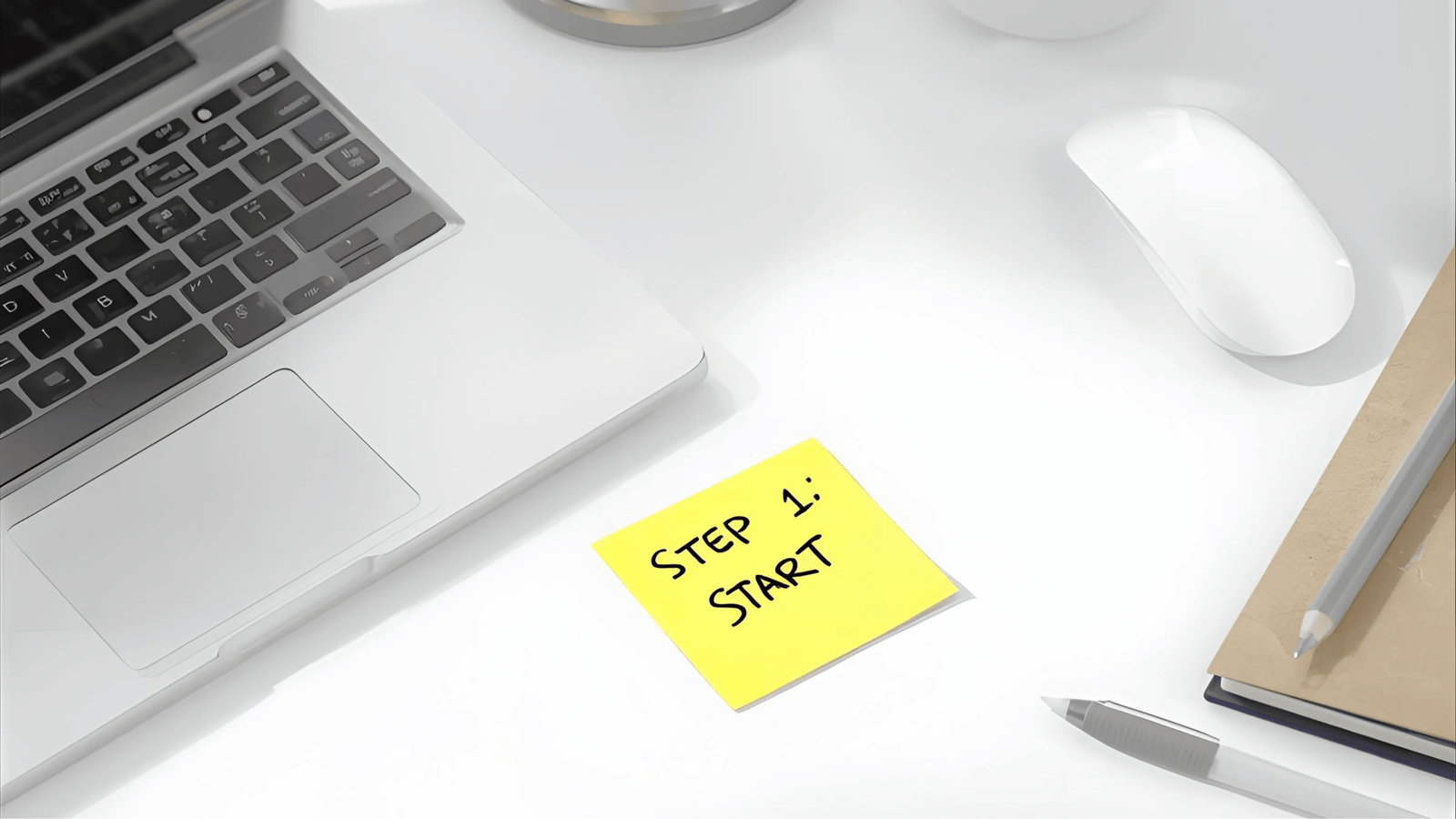 a laptop computer and a keyboard on a desk